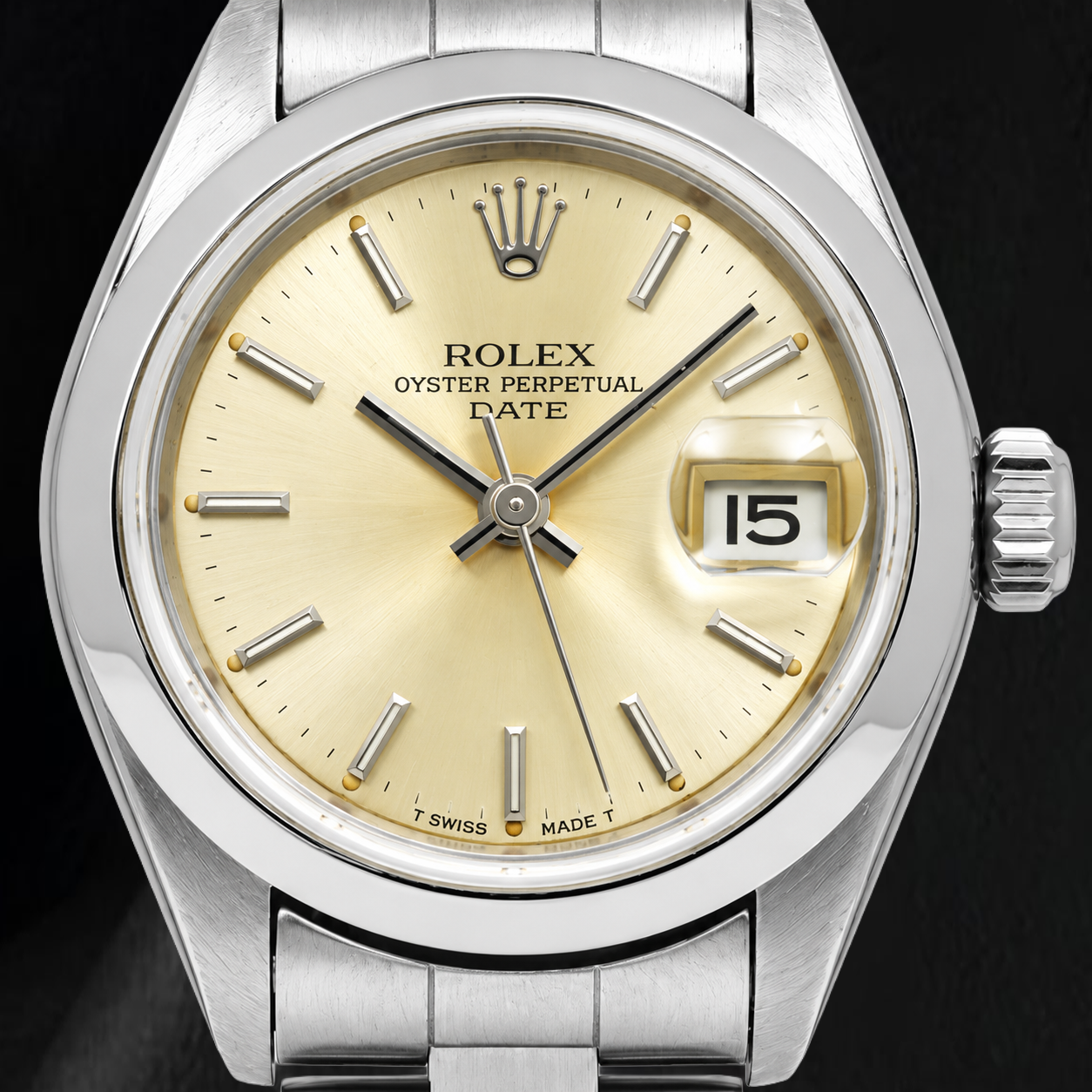 Montre Rolex Date 79160 26 mm Cadran Champagne à Index Bâtons Lunette Lisse Acier Inoxydable