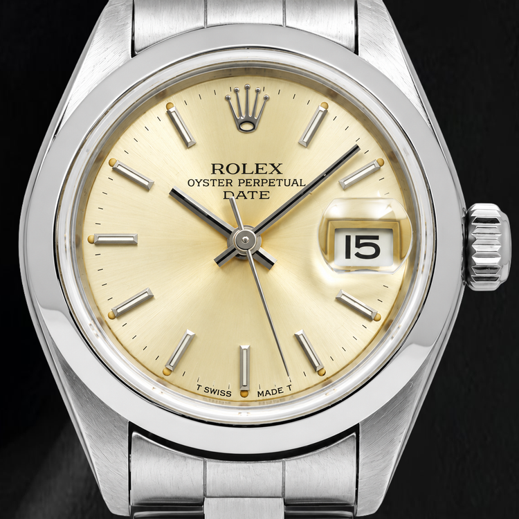 Montre Rolex Date 79160 26 mm Cadran Champagne à Index Bâtons Lunette Lisse Acier Inoxydable