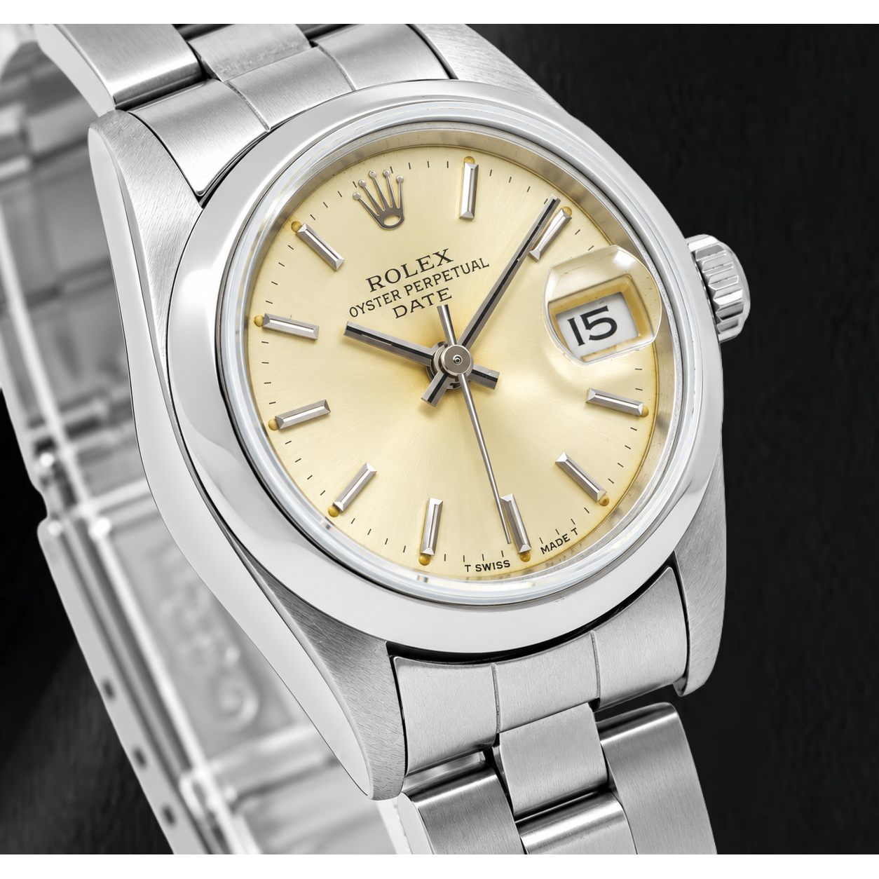 Montre Rolex Date 79160 26 mm Cadran Champagne à Index Bâtons Lunette Lisse Acier Inoxydable