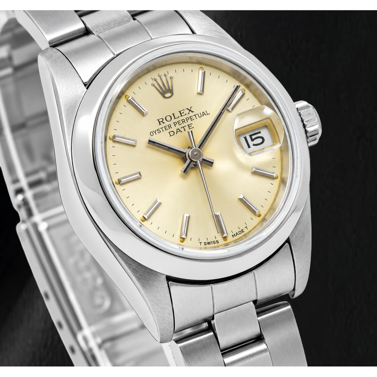 Montre Rolex Date 79160 26 mm Cadran Champagne à Index Bâtons Lunette Lisse Acier Inoxydable