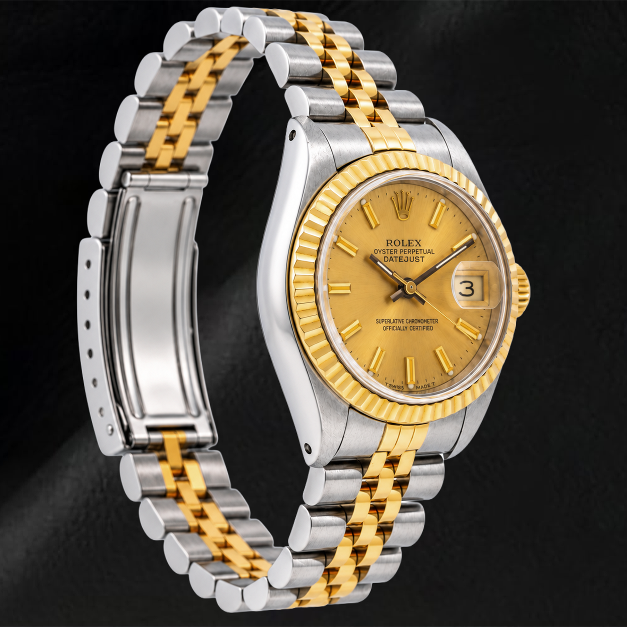 Montre Rolex Datejust 69173 26 mm Cadran Champagne à Index Bâtons Bracelet Jubilé Bicolore