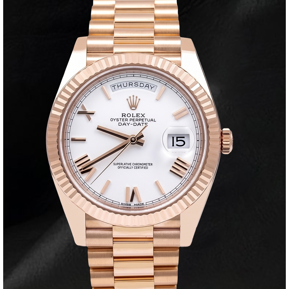 Montre Rolex Day-Date 228235 40 mm en Or Rose Cadran Blanc Chiffres Romains
