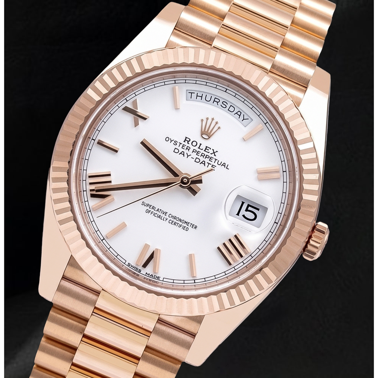 Montre Rolex Day-Date 228235 40 mm en Or Rose Cadran Blanc Chiffres Romains