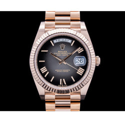 Montre Rolex Day-Date 228235 40 mm en Or Rose Cadran Noir à Chiffres Romains