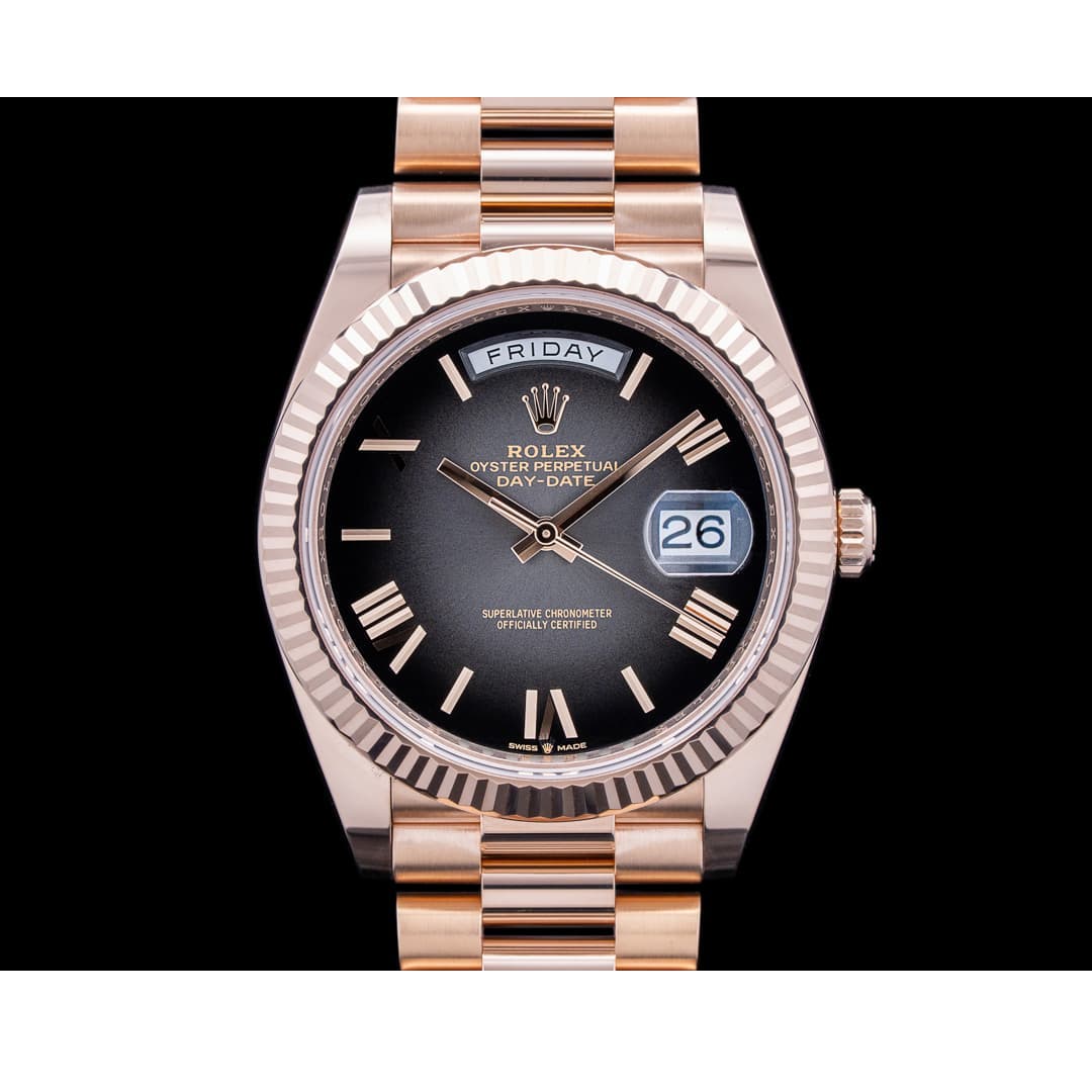 Montre Rolex Day-Date 228235 40 mm en Or Rose Cadran Noir à Chiffres Romains