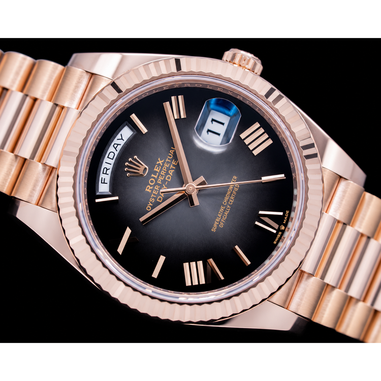 Montre Rolex Day-Date 228235 40 mm en Or Rose Cadran Noir à Chiffres Romains