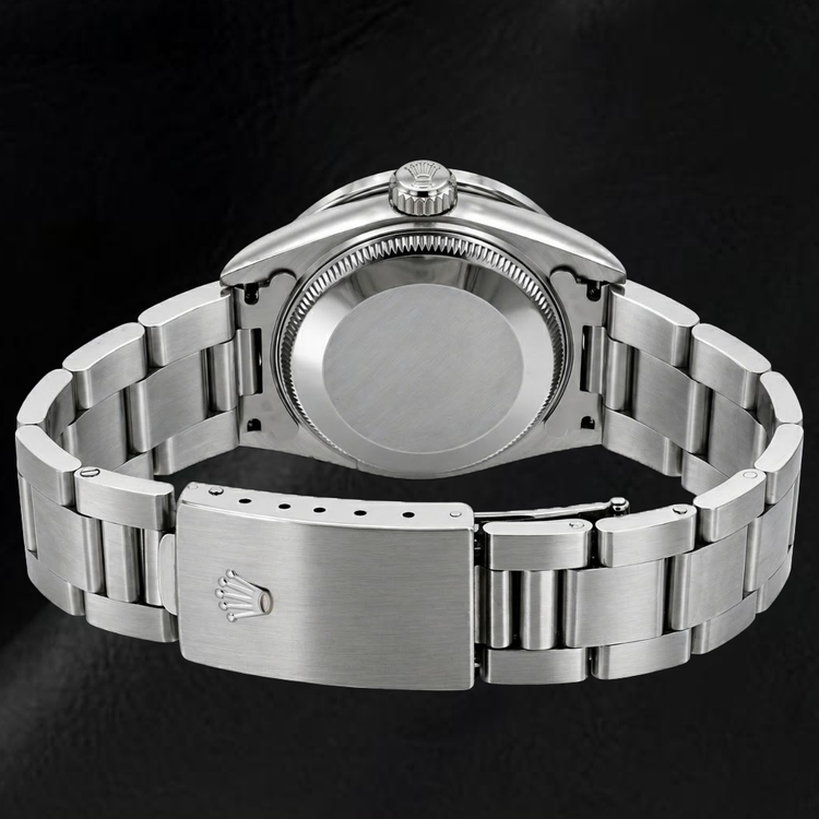 Montre Rolex Oyster Perpetual 26 mm 76030 Cadran Noir à Chiffres Arabes Lunette en Diamants