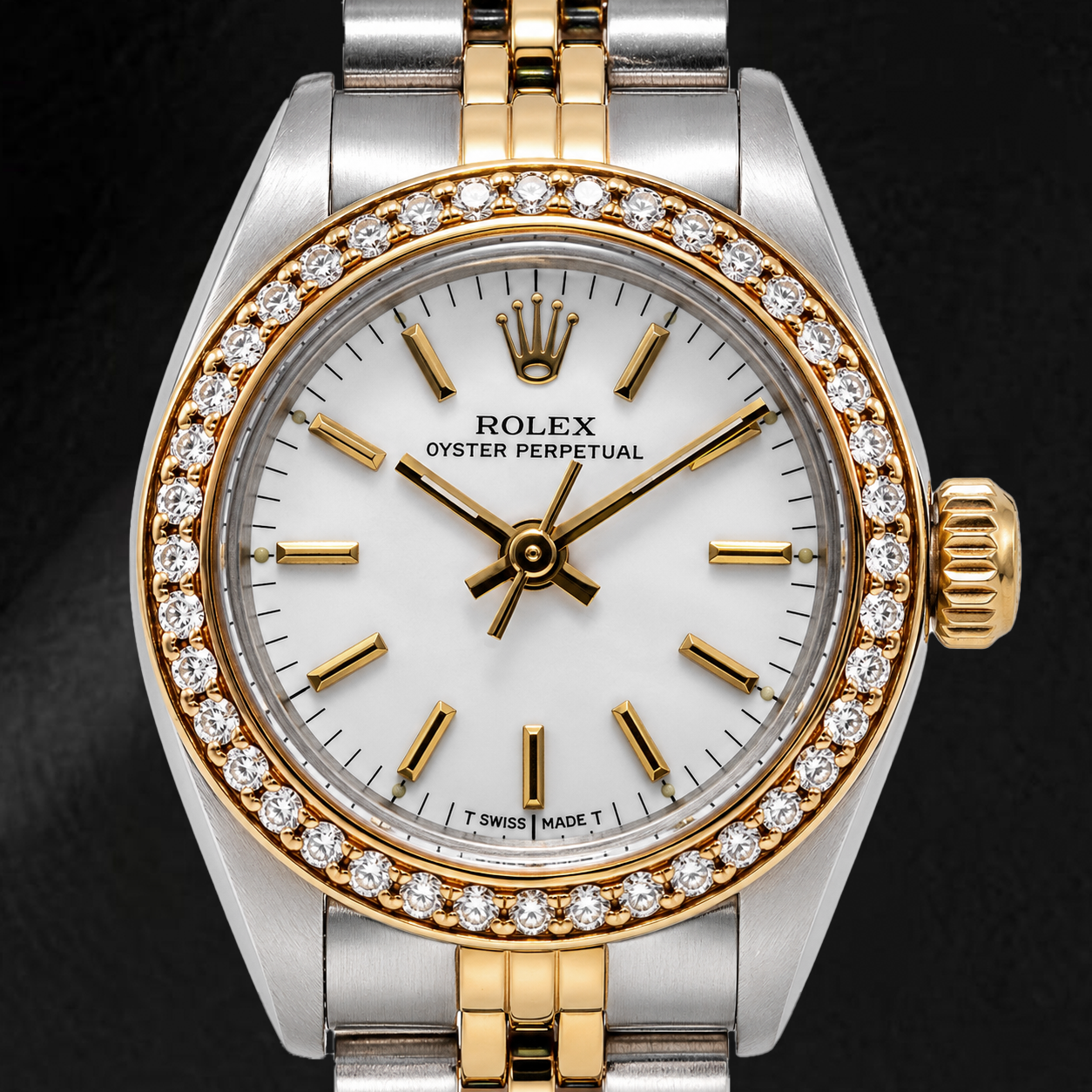 Montre Rolex Oyster Perpetual 67193 26 mm Cadran Blanc à Index Bâtons Bracelet Jubilé Bicolore