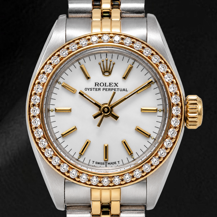 Montre Rolex Oyster Perpetual 67193 26 mm Cadran Blanc à Index Bâtons Bracelet Jubilé Bicolore