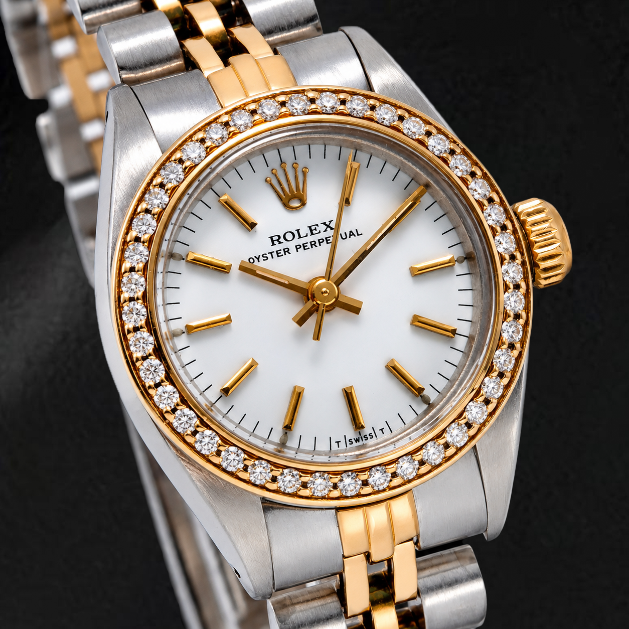Montre Rolex Oyster Perpetual 67193 26 mm Cadran Blanc à Index Bâtons Bracelet Jubilé Bicolore