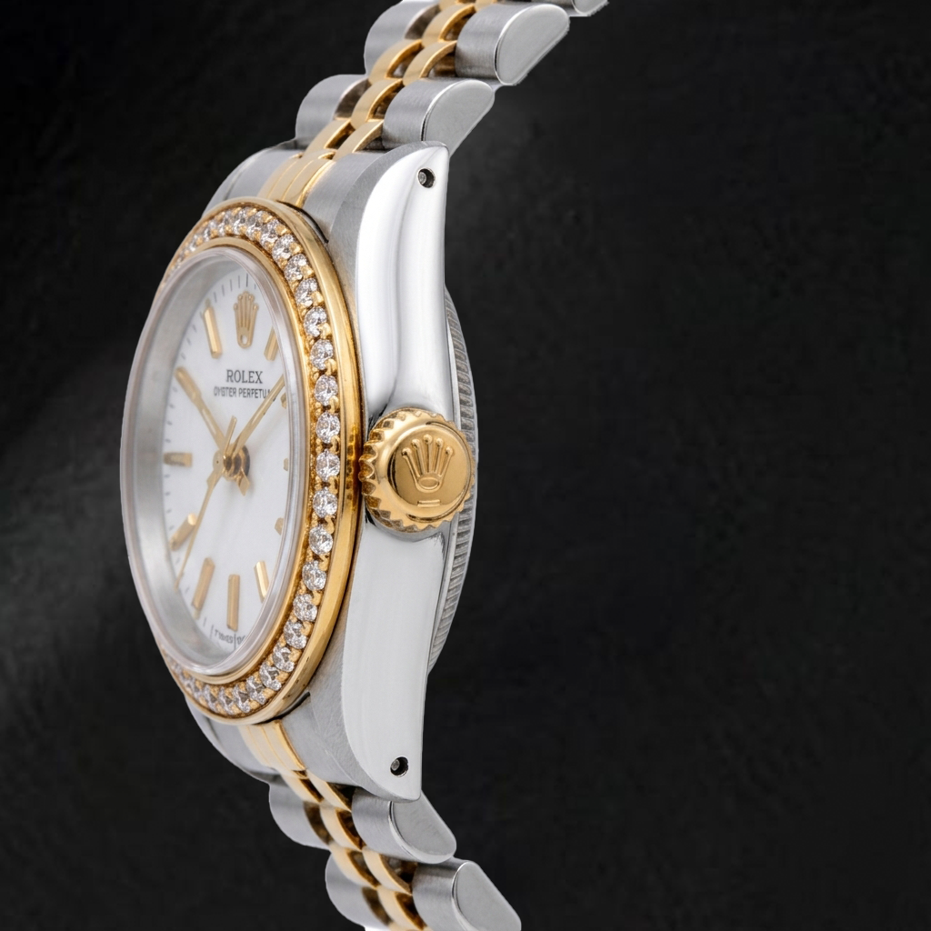 Montre Rolex Oyster Perpetual 67193 26 mm Cadran Blanc à Index Bâtons Bracelet Jubilé Bicolore