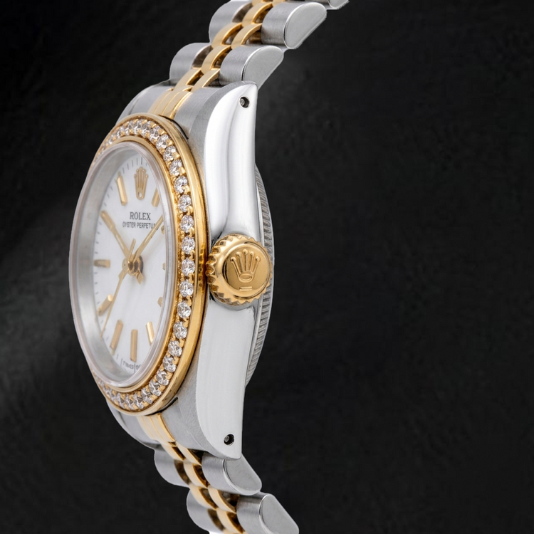 Montre Rolex Oyster Perpetual 67193 26 mm Cadran Blanc à Index Bâtons Bracelet Jubilé Bicolore