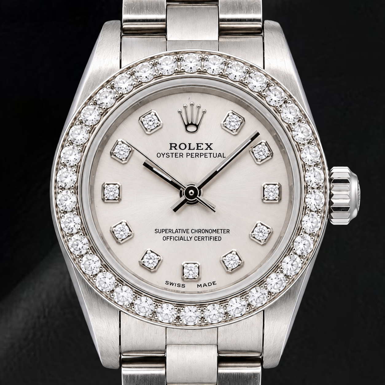 Montre Rolex Oyster Perpetual 76080 26 mm en Acier Inoxydable Cadran Diamants Argenté