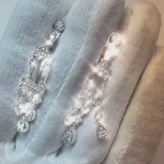 Boucles d'oreilles en forme de lustre scintillant avec un diamant de 3 carats