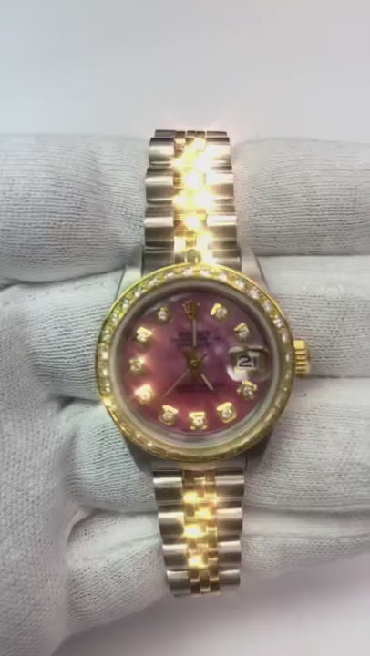 Rolex Montre pour femme en or jaune 18 carats avec cadran rose serti de diamants