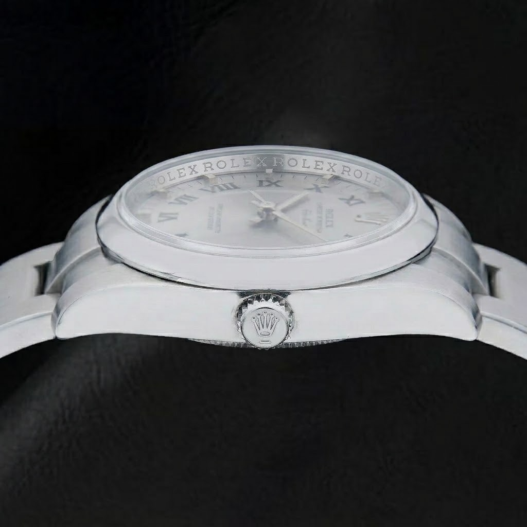 Rolex Air-King 34 mm 114200 Montre en Acier Inoxydable Cadran Argenté à Chiffres Romains Bracelet Oyster