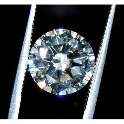 Diamant rond naturel extrait de la terre, 0,75 carat, neuf.