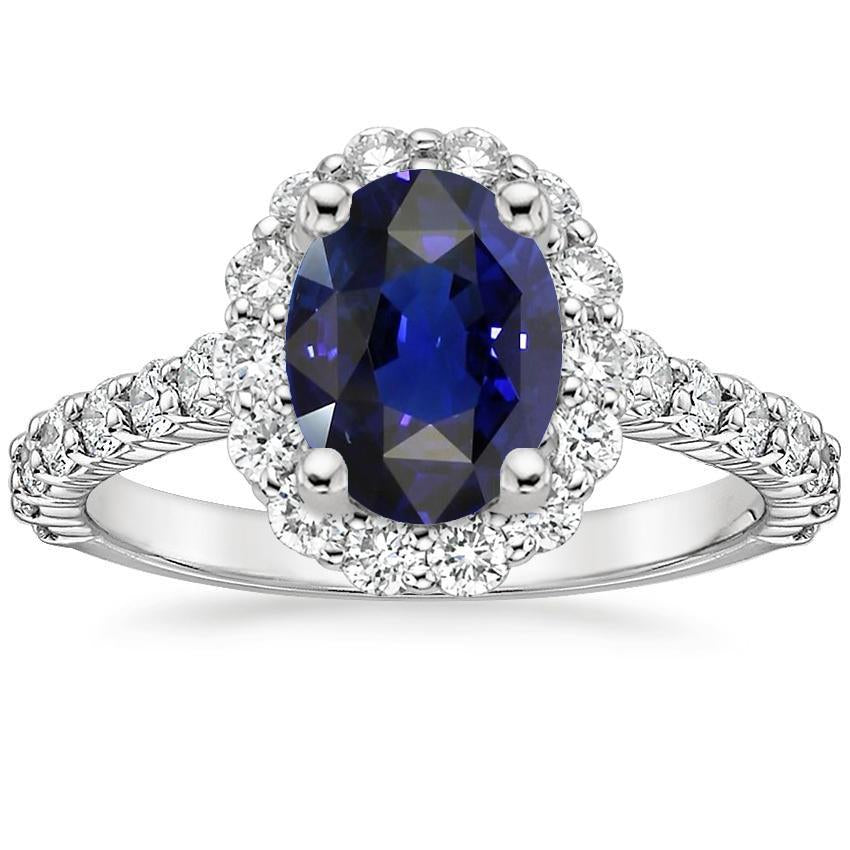 alliance ovale saphir bleu foncé halo or blanc 6 carats