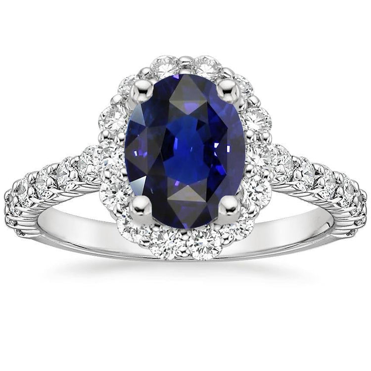 alliance ovale saphir bleu foncé halo or blanc 6 carats