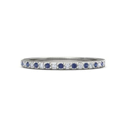 Alliance diamant 0.60 carats serti griffes saphirs bleus