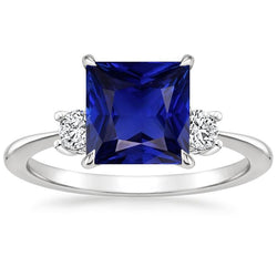 Bague 3 pierres diamant et saphir bleu princesse tige conique 5.50 carats