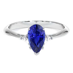 Bague 3 pierres en or blanc Saphir bleu et mille milliards de diamants 2.25 carats