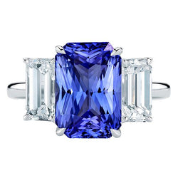 Bague 3 pierres saphir bleu serti de diamants taille émeraude 5.50 carats