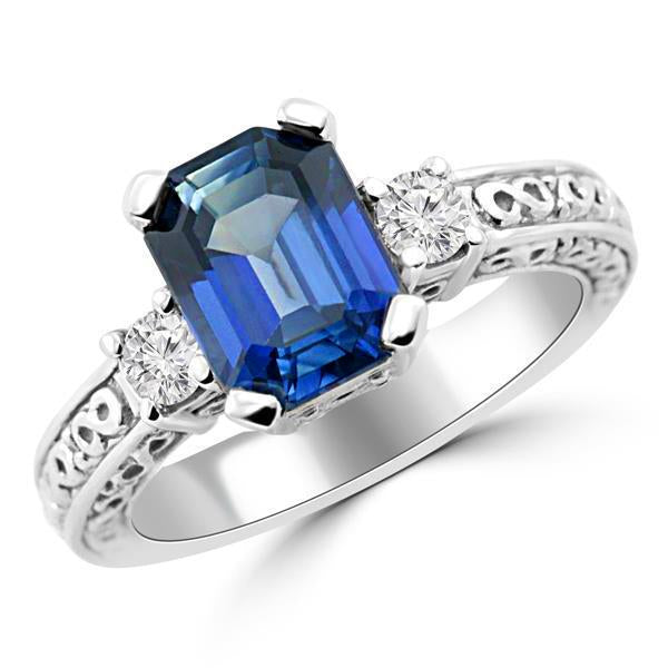 bague 3 pierres saphir taille émeraude bleue et diamants en or 2.50 carats