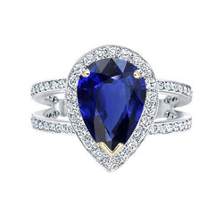 Bague Halo en or bicolore avec saphir bleu profond et diamants 4.50 carats