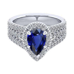 Bague Halo sertie de griffes saphir bleu poire et diamant triple tige 5 carats