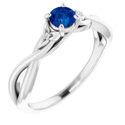 Bague Saphir Bleu 1.50 Carats Tige Torsadée Or Blanc 14K