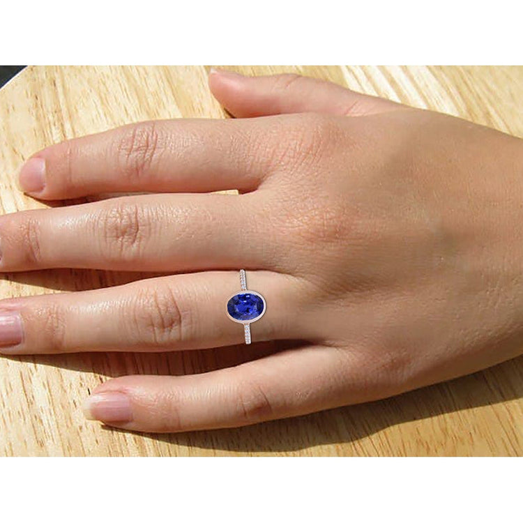 Bague Solitaire Saphir Bleu Lunette Sertie De Diamants Or 3.50 Carats