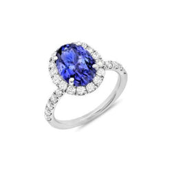 Bague Tanzanite Ovale 11.25 Carats Avec Diamants Ronds Or Blanc 14K