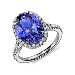 Bague Tanzanite de 6.85 ct avec halo de diamants en or blanc 14K
