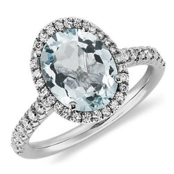 Bague aigue-marine ovale de 11.70 ct et diamants ronds en or blanc 14K