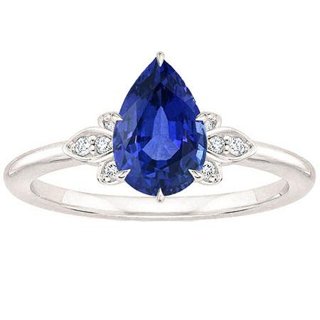 bague anniversaire diamant saphir bleu 2 carats sertie de griffes taille poire neuf
