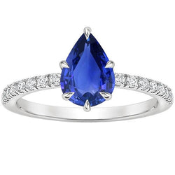 Bague anniversaire saphir bleu et diamants taille poire accentués 5 carats
