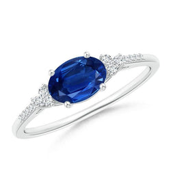 Bague anniversaire saphir et diamants sertie de griffes de 3.50 ct en or blanc