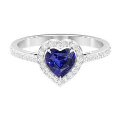 Bague coeur saphir bleu halo et serti de diamants 2.50 carats