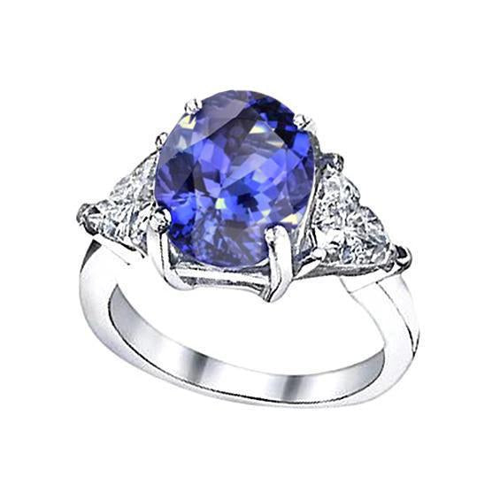 Bague d'anniversaire à trois pierres en diamant ovale de tanzanite de 8,01 carats - HarryChadEnt.FR