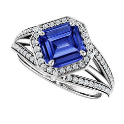 Bague de fiançailles diamant halo émeraude saphir tige fendue 4.50 carats