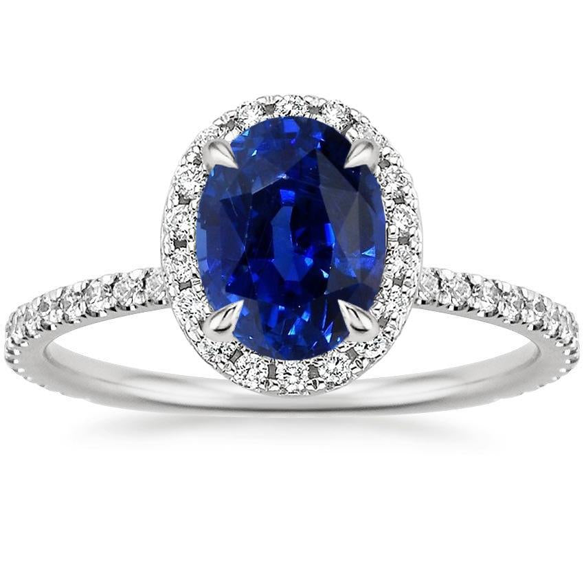 Bague de fiançailles ovale avec halo de diamants bleu saphir accentué de 6.20 carats - HarryChadEnt.FR