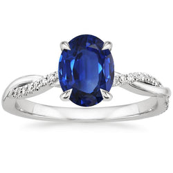 Bague de fiançailles ovale saphir bleu diamant or tige torsadée 6 carats