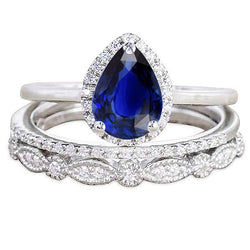 Bague de mariage Halo de style vintage sertie de saphir bleu taille poire 3.50 carats