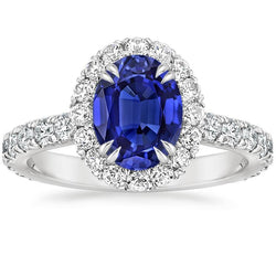Bague diamant halo ovale bleu profond serti griffes de saphir 6.50 carats