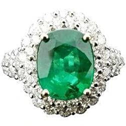 Bague émeraude verte ovale de 3.25 ct avec halo de diamants en or blanc 14 carats - HarryChadEnt.FR