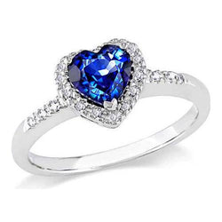 Bague en diamant rond avec saphir bleu de Ceylan de 1.25 ct en or