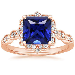 Bague en or rose avec halo de diamants et saphir bleu princesse Milgrain de 5.50 carats