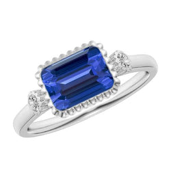 Bague en saphir bleu anniversaire 3 pierres avec lunette en diamant rond 2.25 carats