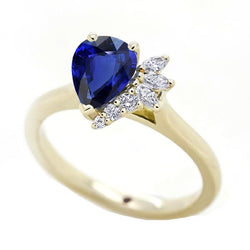 Bague en saphir bleu avec accents ronds et marquise 2.50 carats